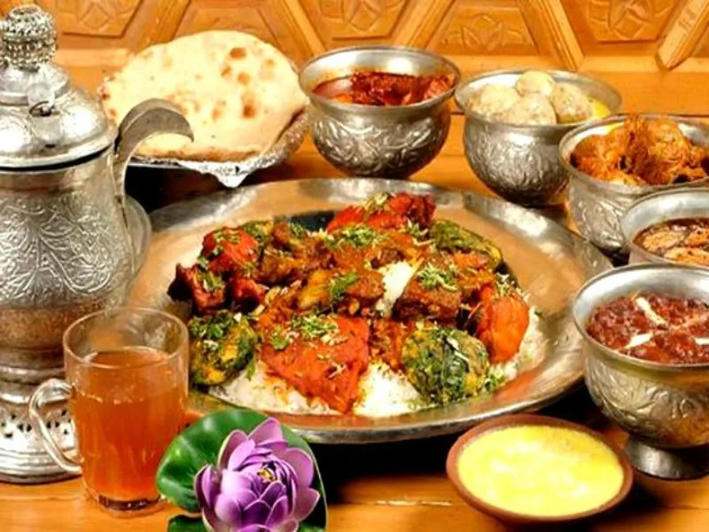 Warm traditional table spread with breads, bowls, and shared food